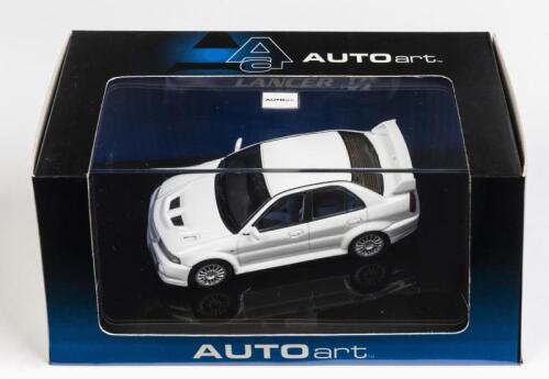MITSUBISHI: A 1:43 scale NOS Autoart Mitsubishi Lancer Evo 6 white die-cast model