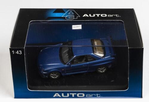 NISSAN: A 1:43 scale NOS Autoart Nissan Skyline R34 GTR 1999 blue die-cast model