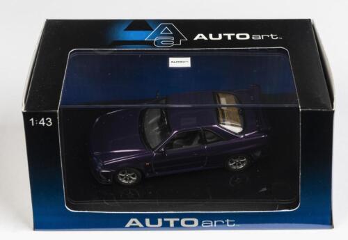 NISSAN: A 1:43 scale NOS Autoart Nissan Skyline R34 GTR 1999 midnight purple die-cast model