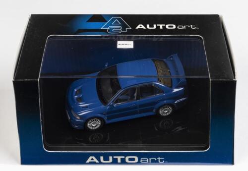 MITSUBISHI: A 1:43 scale NOS Autoart Mitsubishi Lancer Evo 6 blue die-cast model