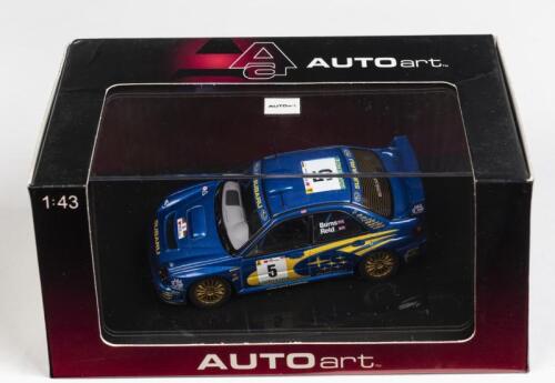 SUBARU: A 1:43 scale NOS Autoart Subaru Impreza WRC 2001 #5 Rally Portugal: Burns/Reid die-cast model