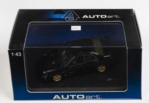 SUBARU: A 1:43 scale NOS Autoart Subaru New Age Impreza WRX STI 2001 black die-cast model