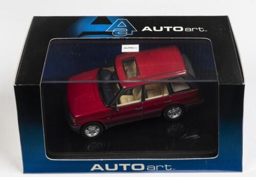 RANGE ROVER: A 1:43 scale NOS Autoart Range Rover 4.6 HSE metallic red die-cast model