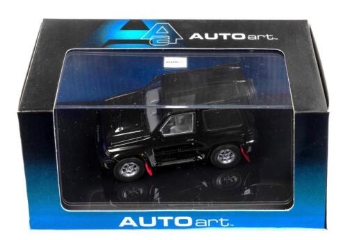 MITSUBISHI: A 1:43 scale NOS Autoart Mitsubishi Pajero Evo black die-cast model