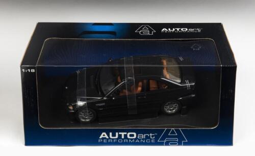 BMW: A 1:18 scale NOS Autoart BMW M3 Coupe black die-cast model