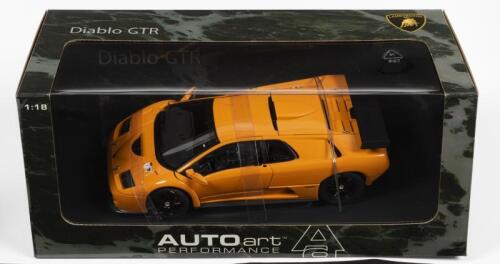 LAMBORGHINI: A NOS 1:18 scale Autoart Lamborghini Diablo GTR - Orange, die-cast model