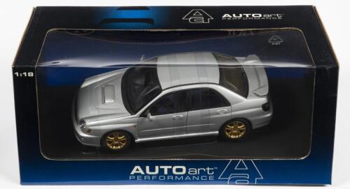 SUBARU: A NOS 1:18 scale Autoart Subaru New Age Impreza WRX Sti 4 Door - silver, die-cast model