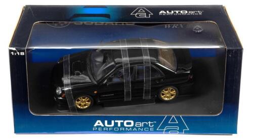 SUBARU: A NOS 1:18 scale Autoart Subaru New Age Impreza WRX Sti - black, die-cast model