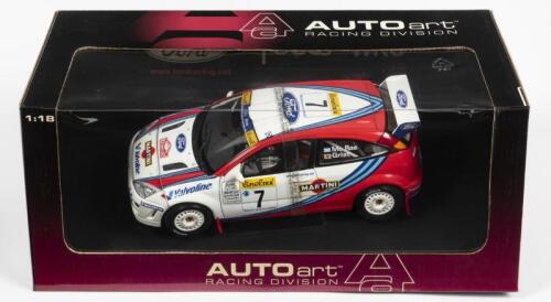 FORD: A NOS 1:18 scale Autoart Ford Focus WRC 1999 Rally Monte Carlo; C. McRae/N. Grist #7, die-cast model