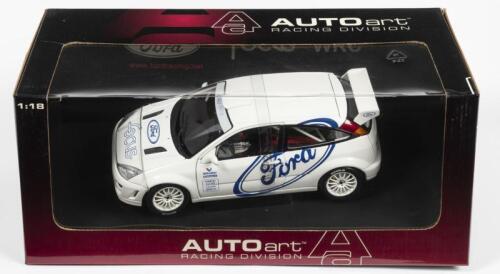 FORD: A NOS 1:18 scale Autoart Ford Focus WRC 1999 Test Car - White, die-cast model