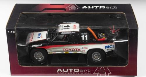TOYOTA: A NOS 1:18 scale Autoart Toyota Trophy Truck #11, die-cast model