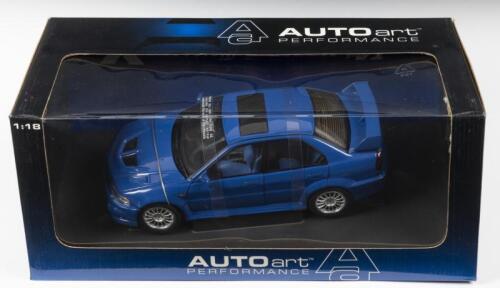 MITSUBISHI: A NOS 1:18 scale Autoart Mitsubishi Lancer EVO VI - Blue, die-cast model