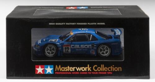 NISSAN: A NOS 1:24 scale Tamiya Calsonic Nissan Skyline GT-R 2003 #12, die-cast model