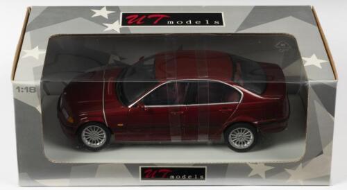 BMW: A NOS 1:18 scale UT Models BMW 328i E46 Saloon - Metallic Red, die-cast model