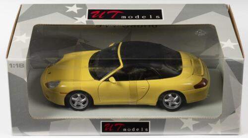 PORSCHE: A NOS 1:18 scale UT Models Porsche 911(996) Cabrio - Yellow, die-cast model