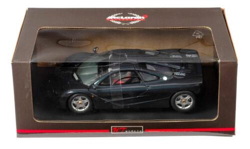 McLAREN: A NOS 1:18 scale UT Models McLaren F1 GTR - Metallic Green, die-cast model