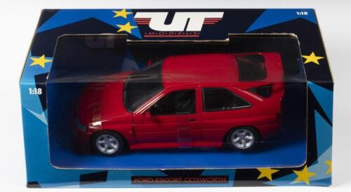 FORD: A NOS 1:18 scale UT Models Ford Escort Cosworth - Red, die-cast model