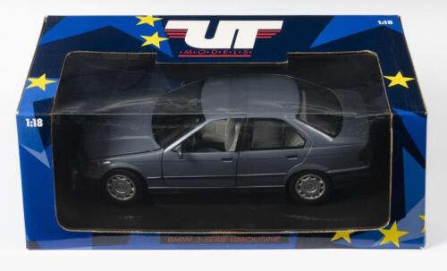 BMW: A NOS 1:18 scale UT Models BMW 3-Series Saloon - Silver Grey, die-cast model