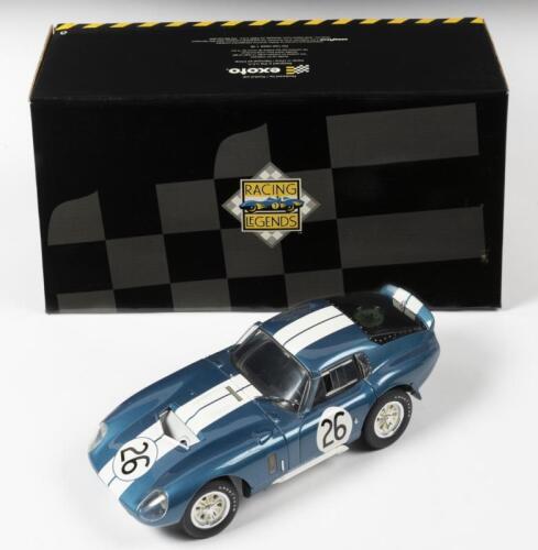 COBRA: A NOS 1:18 scale Exoto #18006 Cobra Daytona Coupe 1965 Class Winner, Reims, France; Bob Bondurant/Jo Schlesser #26, die-cast model