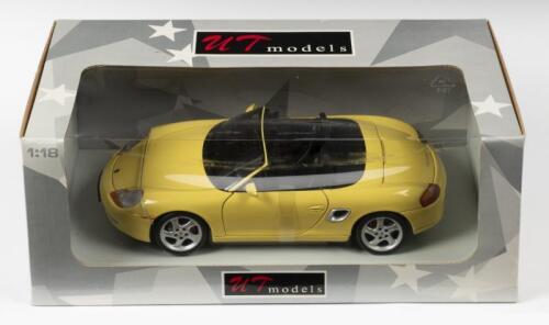 PORSCHE: A NOS 1:18 scale UT Models Porsche Boxster S - Yellow, die-cast model