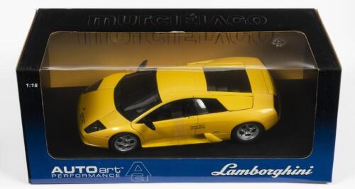 LAMBORGHINI: A NOS 1:18 scale Autoart Lamborghini Murcielago - metallic yellow, die-cast model
