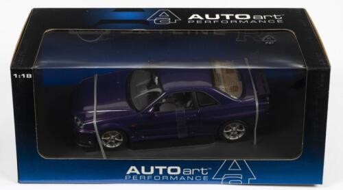 NISSAN: A NOS 1:18 scale Autoart Nissan Skyline 1999 R34 GTR - Midnight Purple, die-cast model