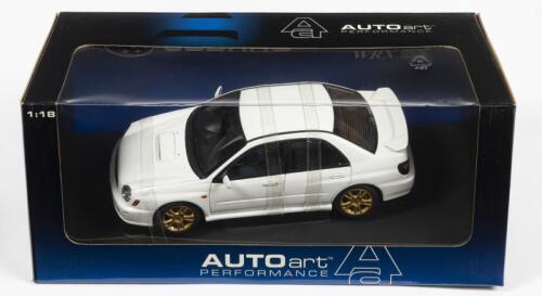 SUBARU: A NOS 1:18 scale Autoart Subaru New Age Impreza WRX Sti - white, die-cast model