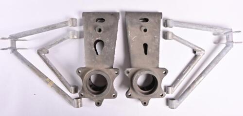 LOTUS: Two magnesium rear uprights and 4 wishbones believed from a Lotus 18,