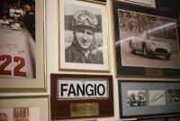 FANGIO: A large signed black and white photograph "To John, Manuel Fangio, 24/10/86" - 2