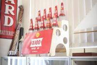 SHELL: A rare circa 1960s Shell X-100 10-bottle oil rack with bottles - 4