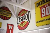 CASTROL: A large early 20th century Castrol Wakefield enamel sign, reading "Wakefield Castrol Motor Oil British owned", overpaint near top centre mounting hole, 90.5cm diameter