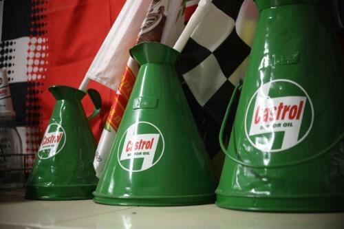 OIL POURERS: Three graduated oil pourers in Castrol livery 1, 2 and 4 gallons, the largest 48cm high