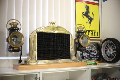 VETERAN RADIATOR AND LAMPS: A veteran brass &ldquo;Tarrant&rdquo; radiator and core with associated coach lamps (updated catalogue entry)