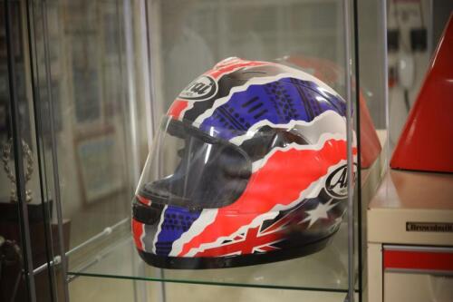 MICK DOOHAN: An Arai RX-7RR3 full face helmet in replica Mick Doohan racing livery, signed by Mick Doohan in black marker
