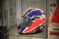 MICK DOOHAN: An Arai RX-7RR3 full face helmet in replica Mick Doohan racing livery, signed by Mick Doohan in black marker