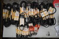 FAN BELTS: A large collection of unused fan belts, perfect for workshop style display
