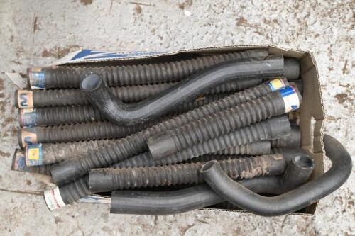 HOSES: Box of various unused old radiator hoses, most ribbed