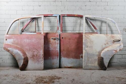HOLDEN: Set of four Holden FJ doors. Left rear missing 1/4 window. Right rear missing main glass, right front missing all glass. Left front with all glass.
