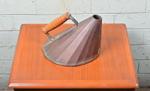 WATER POT: An interested early Copper hot water pot, 17cm high