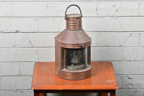 LANTERN: An early ships lamp "Stern" by Tung Woo Hong Kong No. H2072 with clear glass lense,40cm high including handle