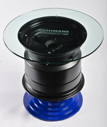 PORSCHE: A etched glass and metal coffee table in the form of a Le Mans Porsche wheel, being a rare six-spoke Porsche 956 962 magnesium alloy racing wheel, ex Rothmans Porsche 1984 Sandown 1000 FIA World Endurance Championship race (see image of CoA added