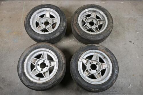 ALLOY WHEELS: A set of Globe style four stud 14"x 7" Performance mag wheels previously used on an RX3 Mazda period racing car (Group C)