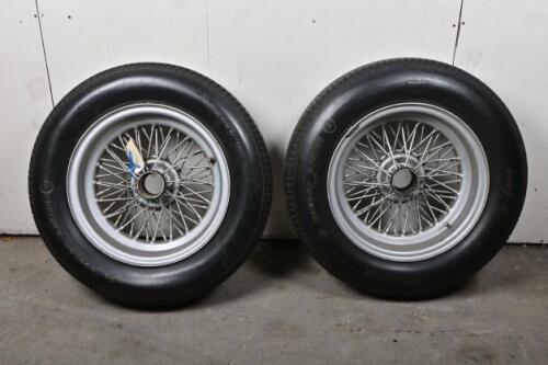MG TC: Two 16" x 6" wire wheels with worn Dunlop Racing 6.00L-16 tyres