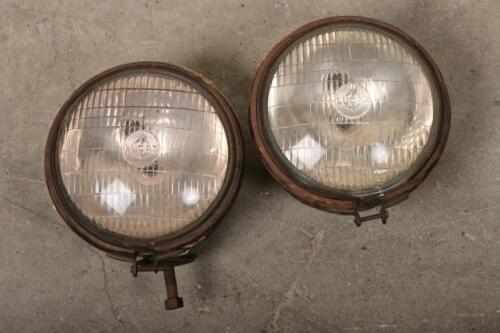 LAMPS: A pair of Lucas 700 headlamps with globes and lenses, 17.5cm convex glass diameter