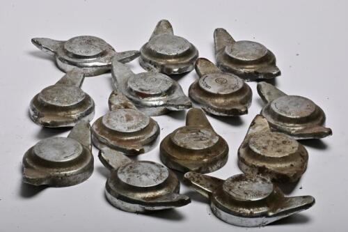 MG: Thirteen wire wheel 'knock offs', 3 with MG logos, one labeled as MGA