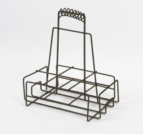 BOTTLE RACK: A vintage six oil bottle rack, 40.5cm high, 36cm wide, 25cm deep