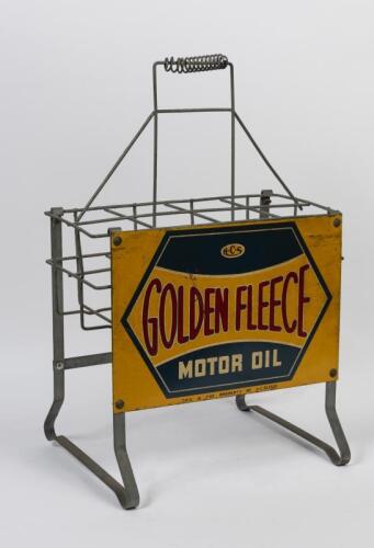 GOLDEN FLEECE: An early 1940&rsquo;s Golden Fleece eight bottle oil rack with one of the original &ldquo;screen printed&rdquo; H C Sleigh Motor Oil signs, 66cm high, 45cm wide, 35cm deep