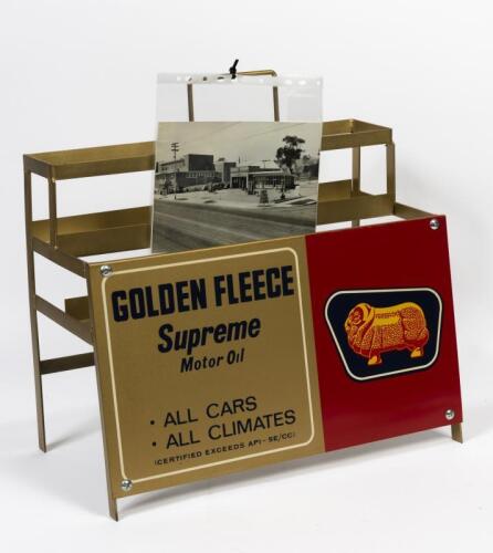 GOLDEN FLEECE: A ten bottle oil rack complete with a NOS Golden Fleece Supreme sign from Heyington Motors in Balwyn, 50cm high, 51cm wide, 17cm deep