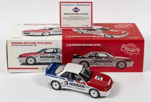 SKYLINE: A 1:18 scale Autoart Nissan Skyline GT-R (R32) as raced by Mark Skaife in 1990 Australian Grand Prix, #3, aerial missing, in double fitted box with COA, box faded