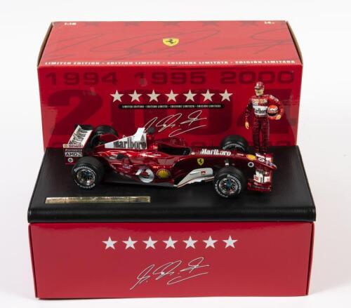 FERRARI: A limited edition 1:18 scale Hot Wheels F1 Ferrari 2004 as raced by Michael Schumacher, seven time world champion 1994, 1995, 2000, 2001, 2002, 2003, 2004, #1, figure Schumacher included, in fitted box